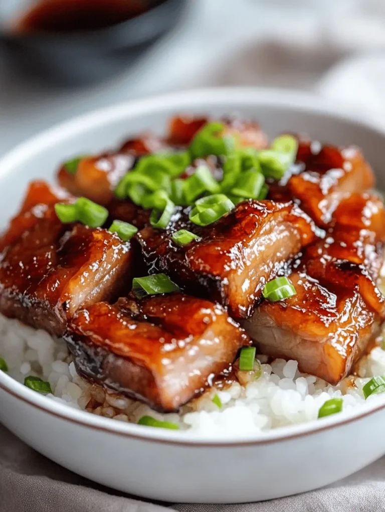 Sake-and-Soy-Braised Pork Belly is a dish that embodies the essence of Japanese home cooking. Known as "Buta no Kakuni" in Japan, this savory delicacy is a beloved staple that showcases the harmonious balance of flavors that Japanese cuisine is famous for. The dish features succulent pieces of pork belly that are slow-cooked in a rich, umami-laden sauce made from sake, soy sauce, mirin, and a hint of sweetness from brown sugar. As the pork belly braises, it transforms into tender bites that melt in your mouth, making it a comfort food favorite for many.