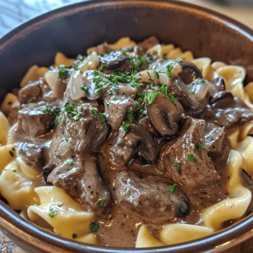 Beef Stroganoff is more than just a dish; it’s a classic comfort food that has woven itself into the fabric of home cooking across various cultures. Originating from Russia, this dish has evolved over the years, adapting to different tastes and regional ingredients while retaining its essential characteristics. Typically made with tender strips of beef, a creamy sauce, and served over a carbohydrate base, Beef Stroganoff is celebrated for its rich flavor and satisfying nature.